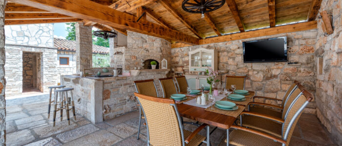 Casa Di Roccia holiday house outside kitchen and lounge area.